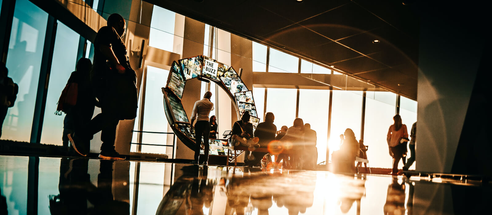 People working in glass room